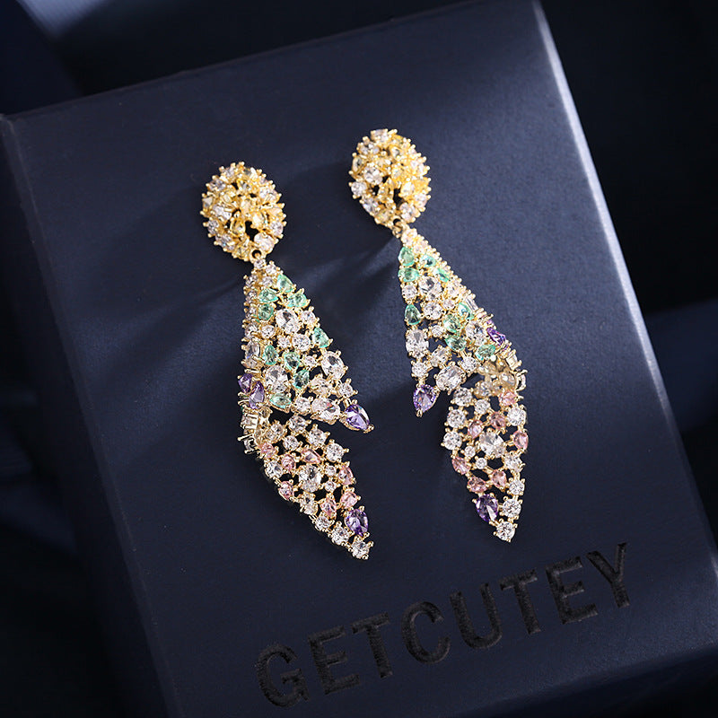 European and American Heavy Industry Color Zirconia Earrings Exaggerated Personality Irregular Zirconia Earrings for Women 925 Silver Needle Conch Earrings Fashionable and Exquisite Popular Clothing Evening Gifts Dress Versatile Shining Feather Shape