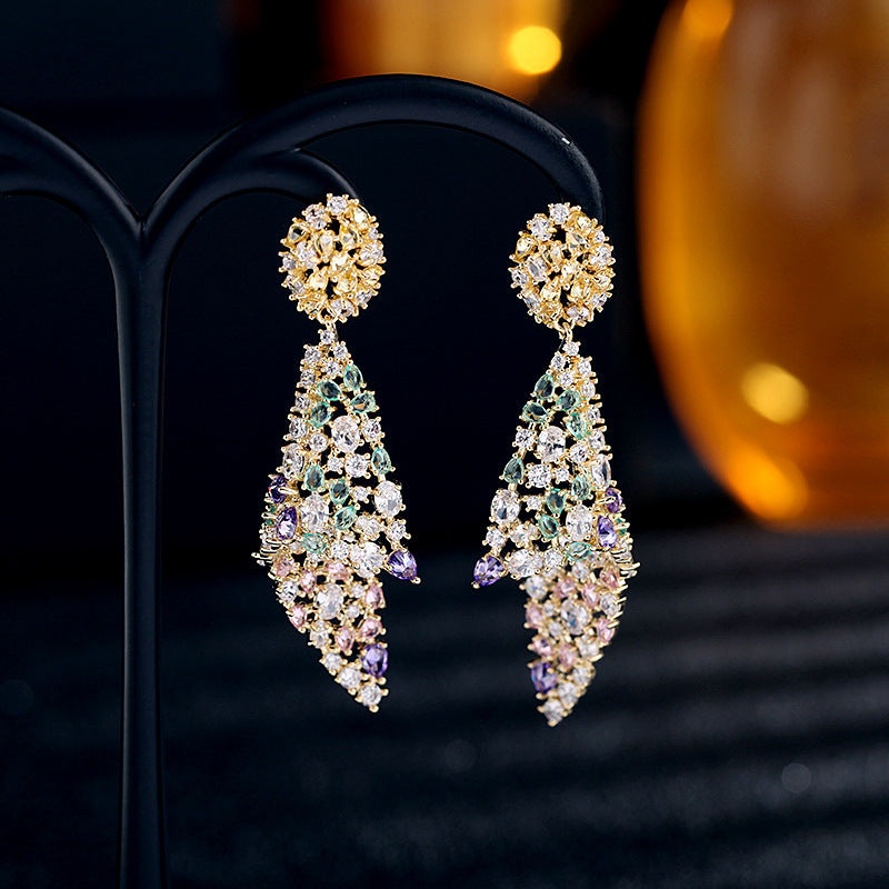 European and American Heavy Industry Color Zirconia Earrings Exaggerated Personality Irregular Zirconia Earrings for Women 925 Silver Needle Conch Earrings Fashionable and Exquisite Popular Clothing Evening Gifts Dress Versatile Shining Feather Shape