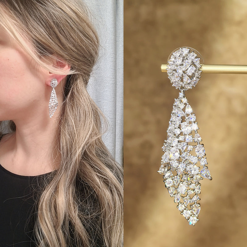 European and American colored zirconia earrings, exaggerated personality, irregular women's earrings, 925 silver needle conch earrings, fashionable and exquisite fashion, evening gift dress, multifunctional shiny feather design, exquisite gift for fr