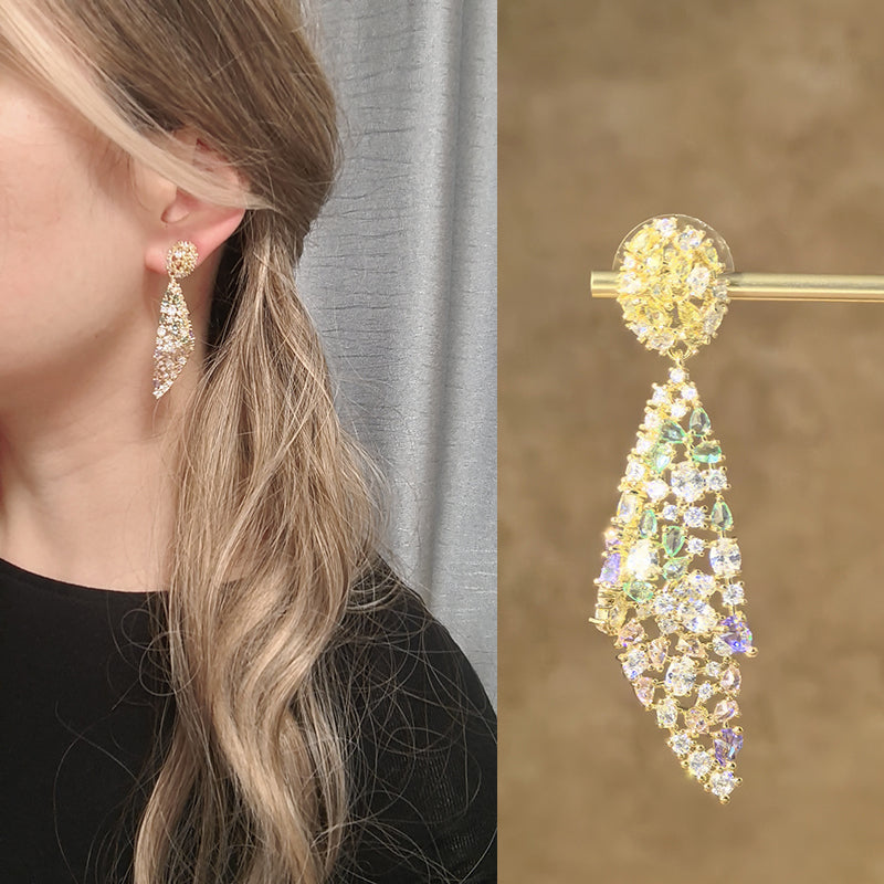 European and American colored zirconia earrings, exaggerated personality, irregular women's earrings, 925 silver needle conch earrings, fashionable and exquisite fashion, evening gift dress, multifunctional shiny feather design, exquisite gift for fr